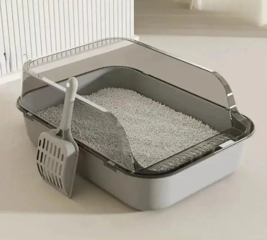 Bac à litière compact pour chat gris à parois fumées relevées, pelle accrochée sur le flanc