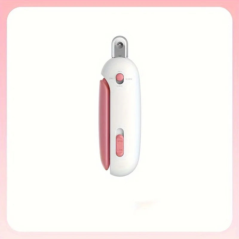 Coupe-griffes compact blanc et rose, lame apparente et curseur de réglage sur le corps — coupe griffe chat